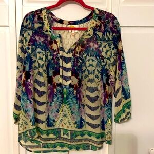 Beautiful blouse with lots of deep colors of green, purple and yellow.